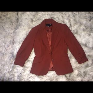 Burnt Orange blazer. 3/4 sleeves.